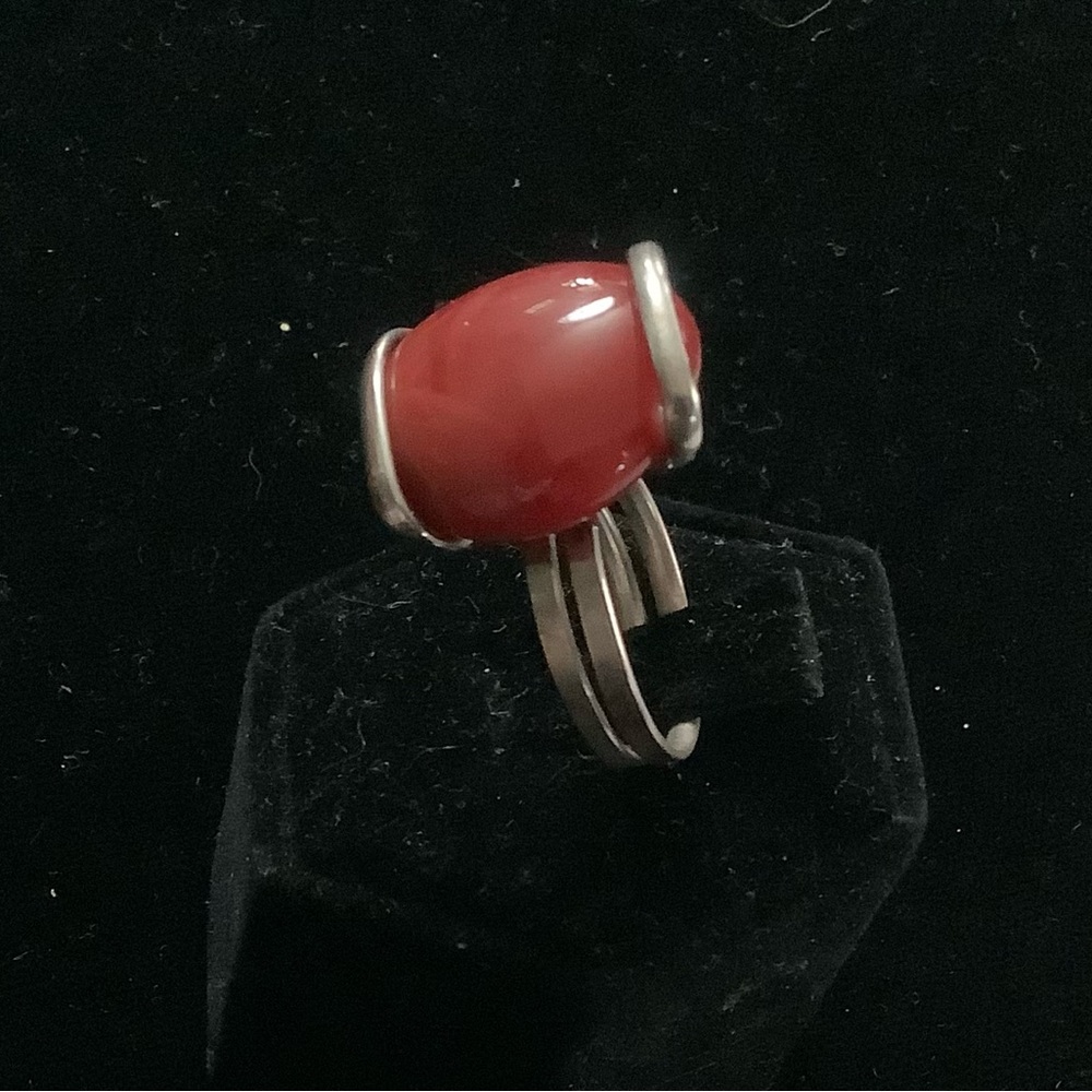 Silver and Coral wire wrap ring. From Mexico. Adjustable in size 8-9